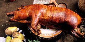 Indonesia, Bali, a babi guling (roast pig) on a market